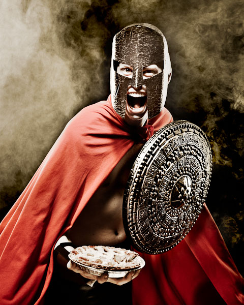 austin portrait photographer mock spartan holding an apple pie