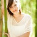 austin portrait photographer senior girl leaning against bamboo thumbnail