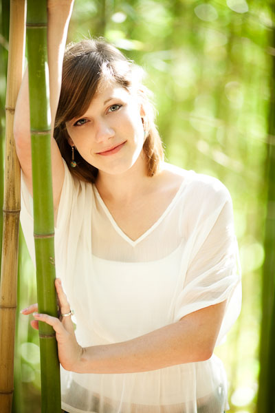 austin portrait photographer senior girl leaning against bamboo
