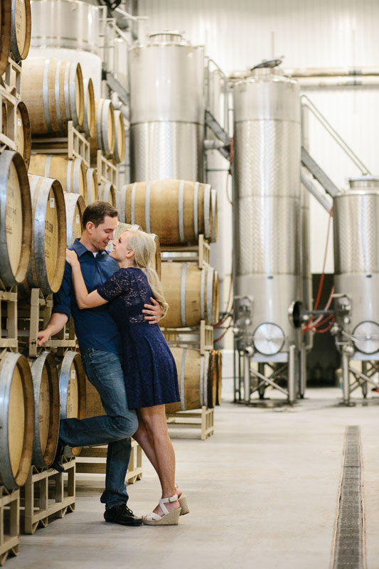 couples engagement photo in winery